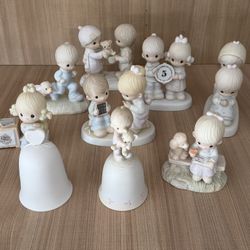    Lot of 11 Precious Moments Porcelain Figurines