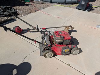 Troy built  lawnmower and weedeater