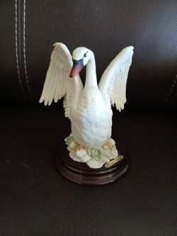 Swan  with  open  wings