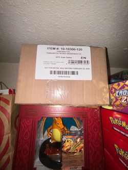 Charizard x y tins sealed case