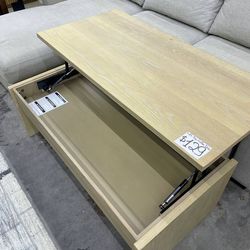 Light wooden coffee table with storage from Costco