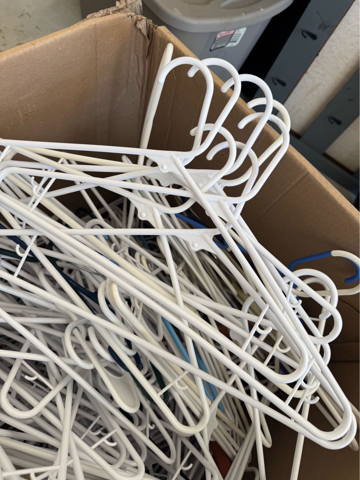 large box of plastic hangers!