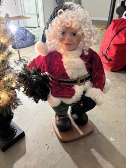 Standing Santa Claus with Christmas tree