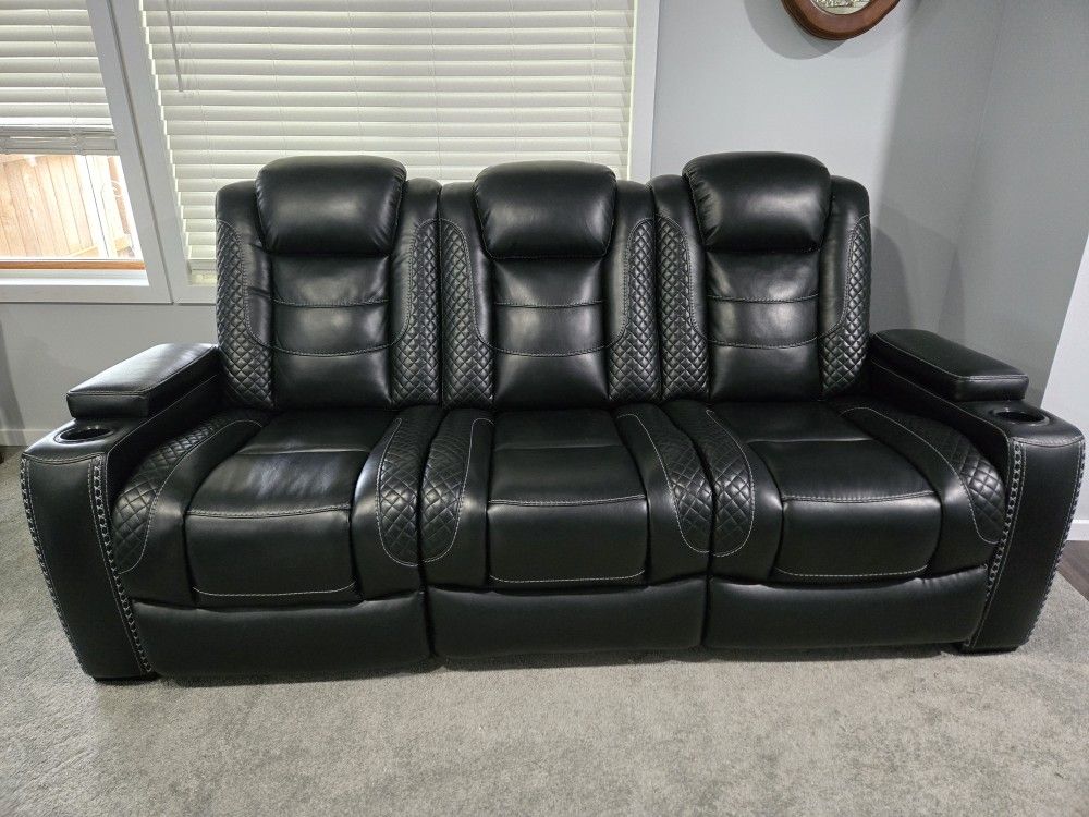 Black Ashley Sofa Duel reclining with lights