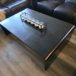 Coffee table. Used wear. Wood. Black