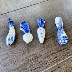 Fun set of 4 blue and white Asian chopstick holder rests
