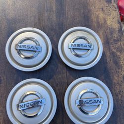 Nissan Pathfinder center caps 