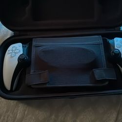 Play Station portal white in color/ and a white case