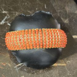 Matted Gold Tone Coral Color Beaded Stretch Bracelet