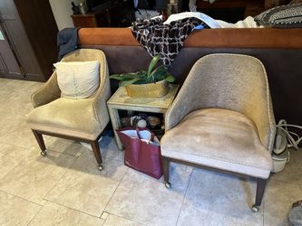 Vintage Chairs On Rolling Wheels