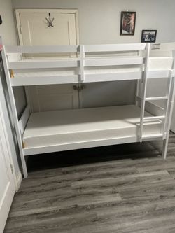 Twin over twin bunk bed. White or espresso. Assembly required. Assembly not included. Taxes included. Free delivery.  Bunk Bed only without Assembly-$