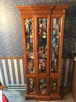 Curio cabinet with glass shelves