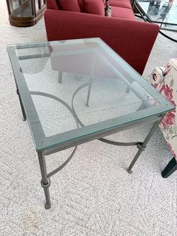 Glass and iron coffee table and side table