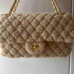 shepra flap bag with gold hardware 