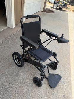 Foldable power/manual wheelchair
