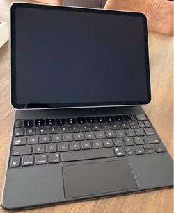 iPad Pro 3 + cellular, with keyboard