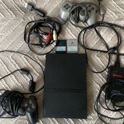 PS2 SLIM black Playstation 2 slim clean with cables and controllers memory card