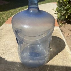 9 Empty 5 Gallon arrowhead Water Bottles.     