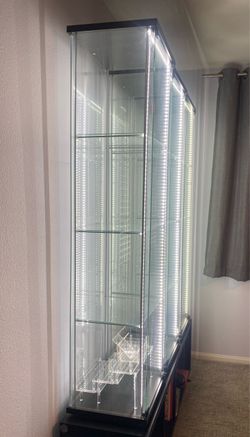 IKEA glass cabinets with black wood base