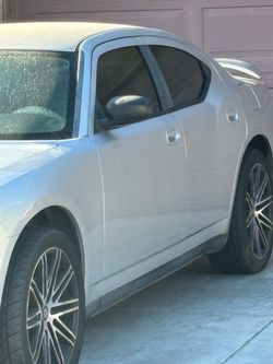 2007 Silver Sedan with Tinted Windows dodge charger