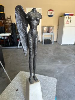 Iron one win angel statue