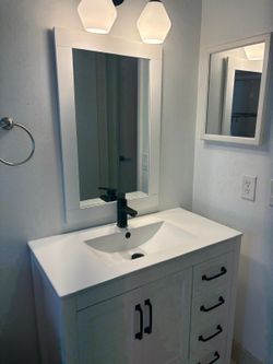 36” White vanity with black handles