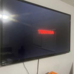 50 inch tv with a no stud tv mount. A new fire stick and remote 
