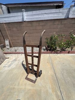 Antique steel and wood dolly