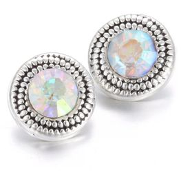 Pair Of 12mm silver and iridescent snap buttons