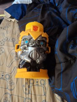 This is a Hasbro Transformers Bumblebee molded sipper mug from Universal Studios