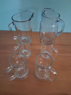 2 heavy glass pitchers and 4 mugs