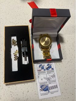 Gold Movado Watch w/ Diamond in Face