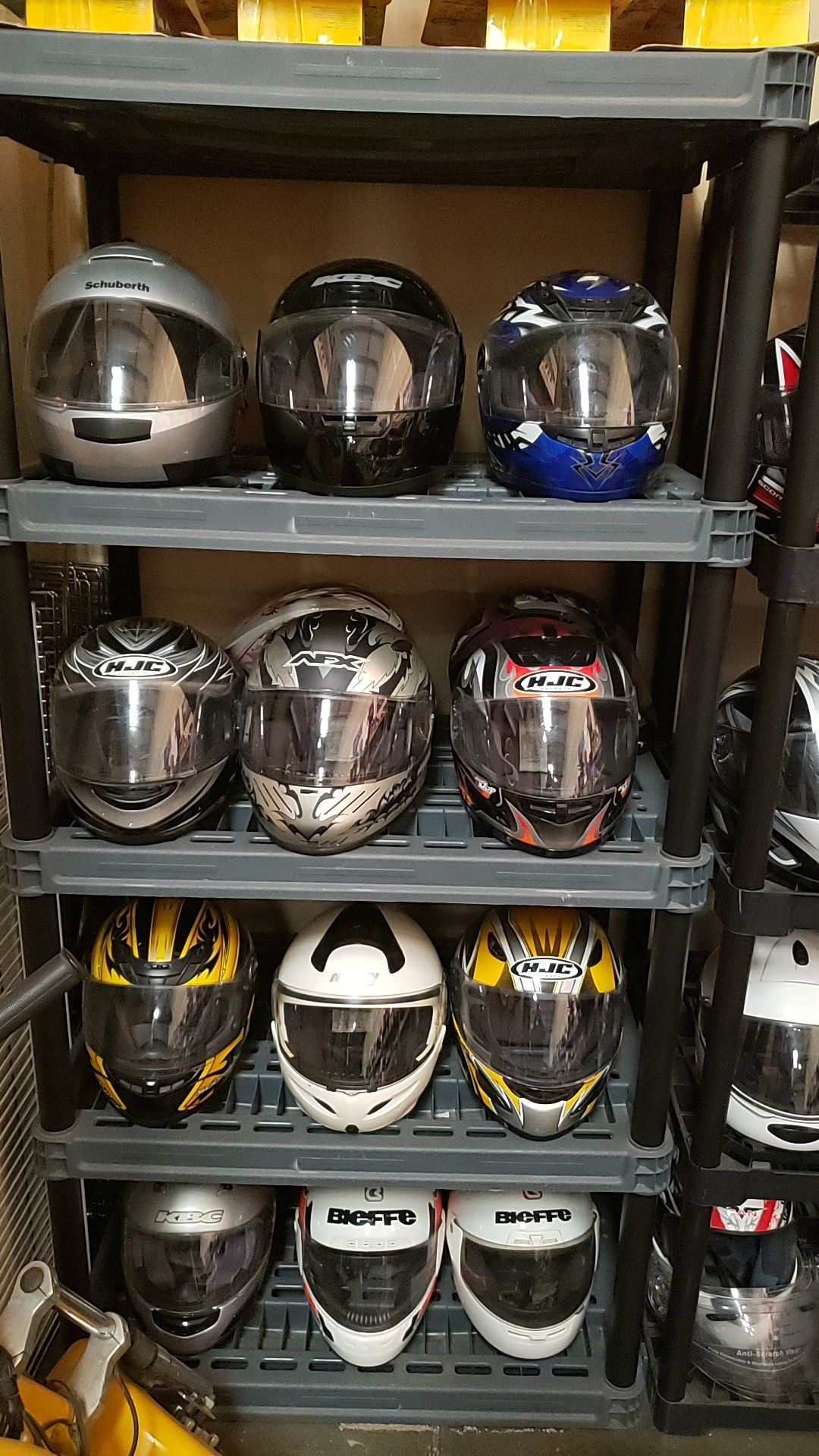 Large assortment of motorcycle helmets HJC , SHOEI , SCORPION, SEVEN ZERO SEVEN