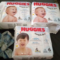 3 packs of Huggies snug and dry,unopened.1 pk size 6,2 pks size 5