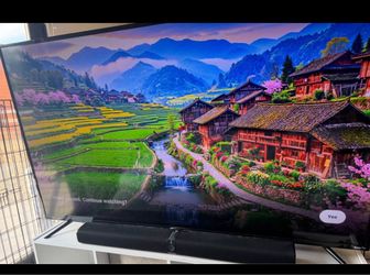 65 inch OMN Roku TV with Amazon purchased sound bar