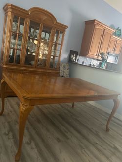 Wood table and four chairs.