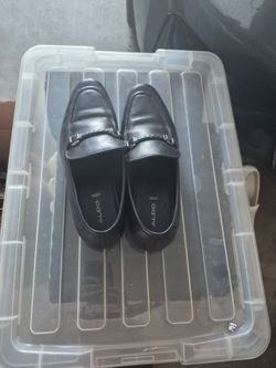 Black loafers with chain
