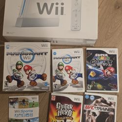 Nintendo Wii Console And Five Games