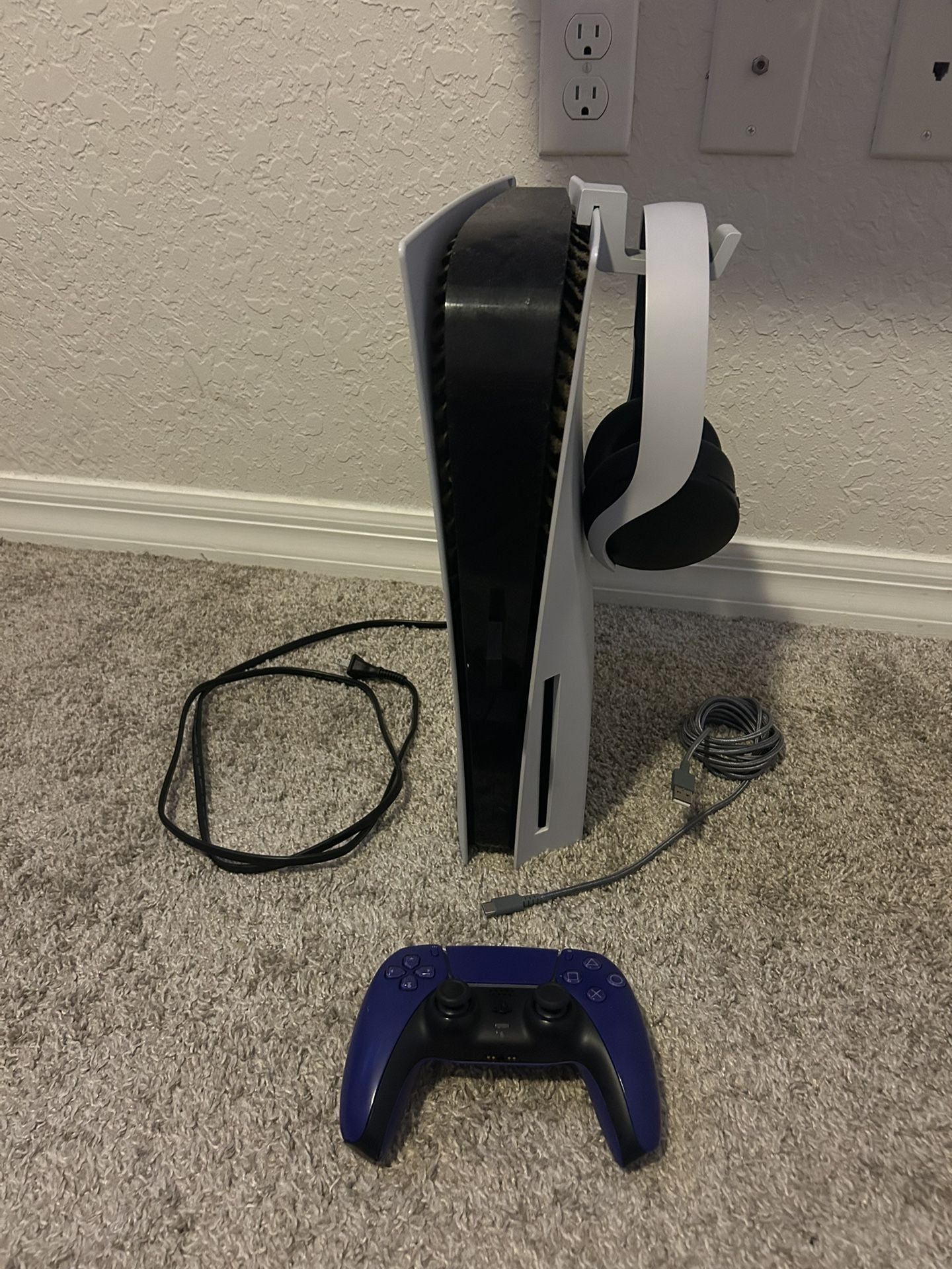 PS5 disc version with controller and headset