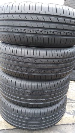 Four matching bright new tires for sale 225/60/16