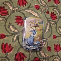 Prismatic Evolutions Tin New And Sealed