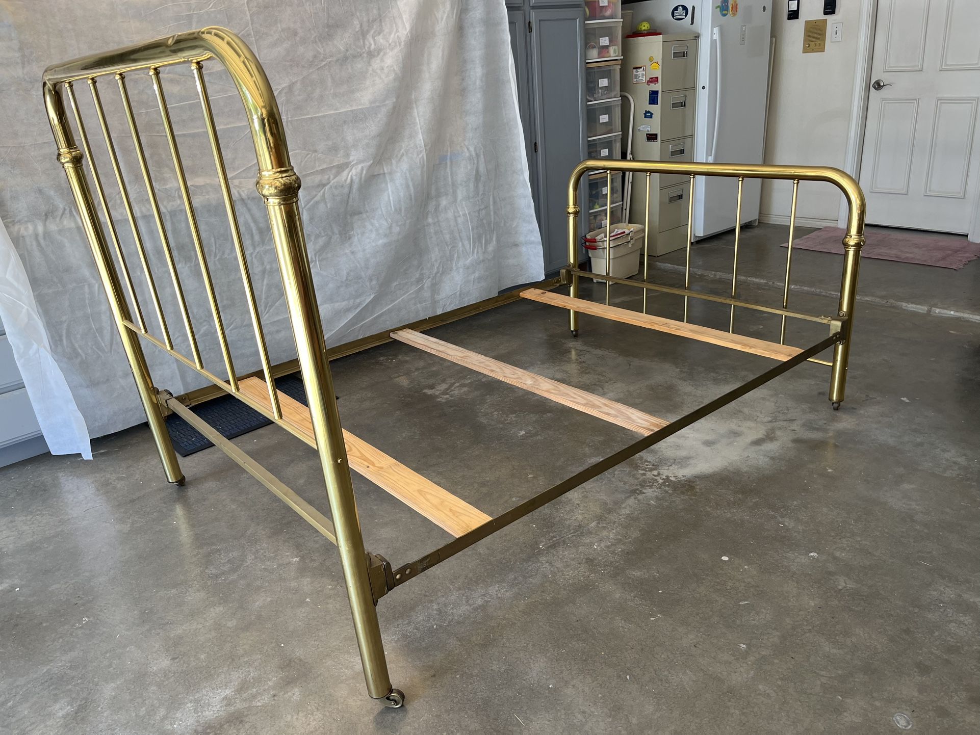  1920’s antique brass bed with roller feet $250