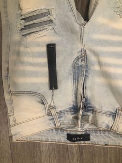 Amiri Light Wash Distressed Denim Jeans