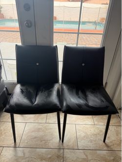 Black chairs with Rhine stone in the middle
