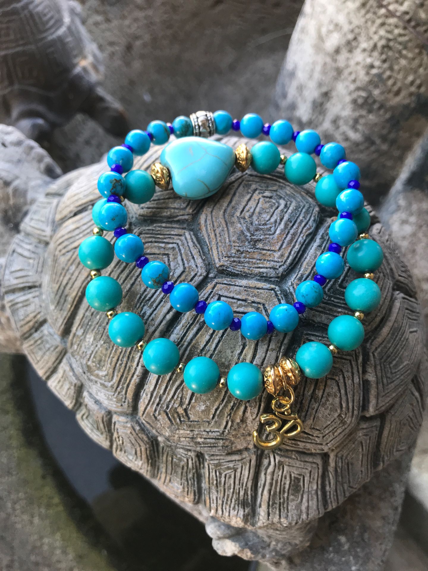 Turquoise stretch bracelets with om charm size 7.5 inches