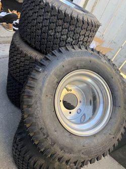 5 New Goodyear tires and rims