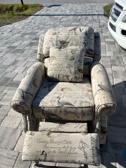 Very soft beige ivory bird song recliner with a pillow loveseat