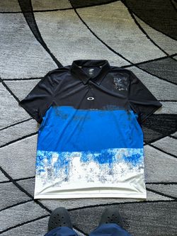 Oakley blue and black polo