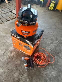 RIDGID 6 Gal. 150 PSI Portable Electric Oil-Free Jobsite Pancake Air Compressor with 25 ft. Air Hose and 18GA Brad Nailer