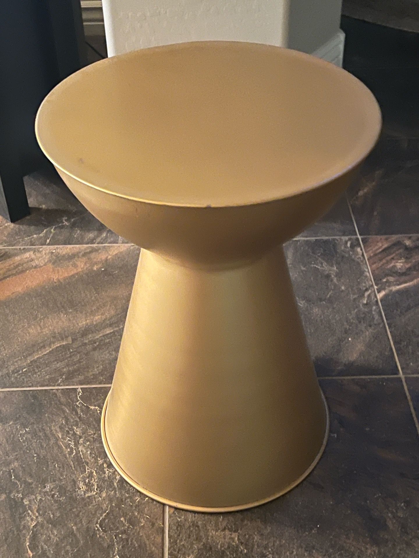 Round metal end table